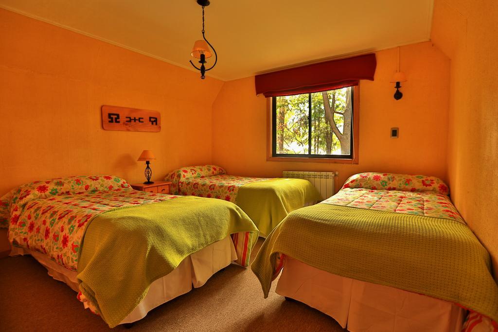 Hotel Y Cabanas Patagonia Green Puerto Aysen Quarto foto